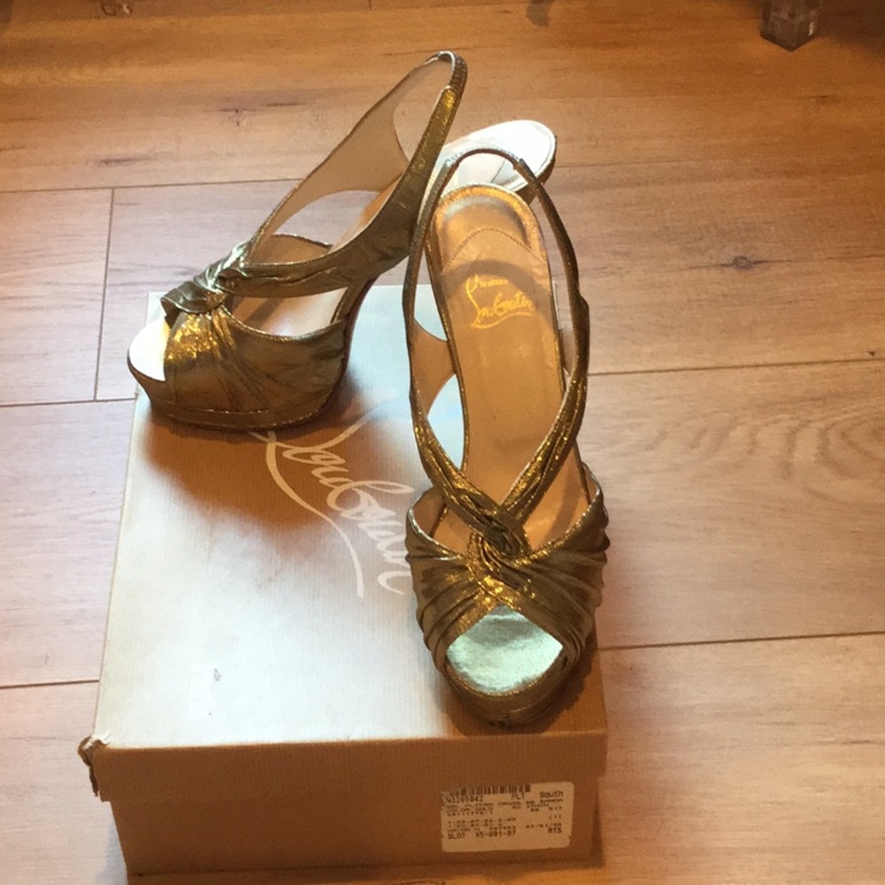 Christian Louboutin Fortuna 140 Lurex gold shoes.